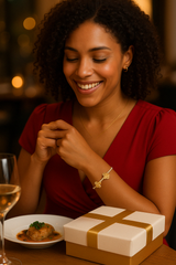Model wearing a clover motif bracelet with radiant white gemstones